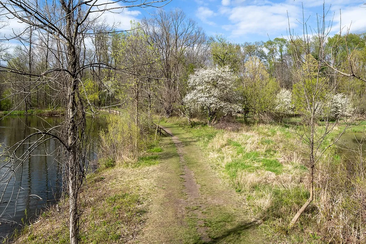 Pond and trail at For-Mar Nature Preserve in Burton, Michigan
